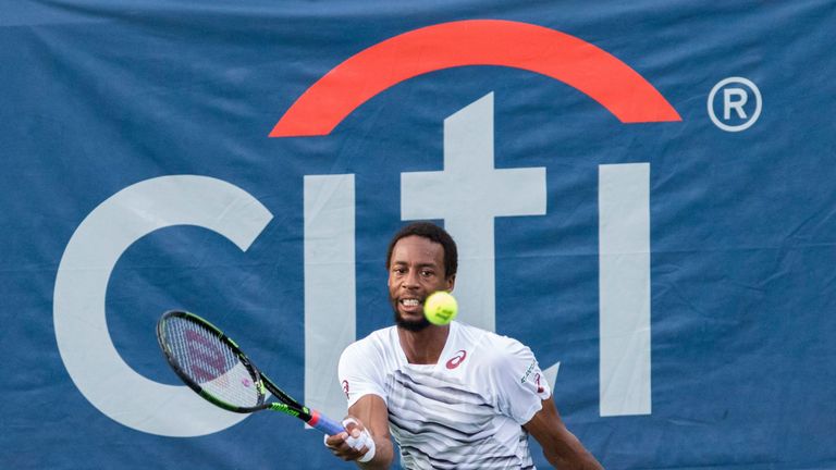 Gael Monfils of France returns the ball during his men's singles semifinals match against Alexander Zverev of Germany during the Citi Open