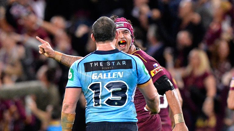 Johnathan Thurston of the Maroons celebrates victory as he yells at Paul Gallen of the Blues during game two of the State Of Origin series 2016