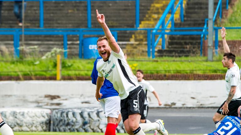 Inverness captain Gary Warren celebrates having put his side back in front at Cowdenbeath