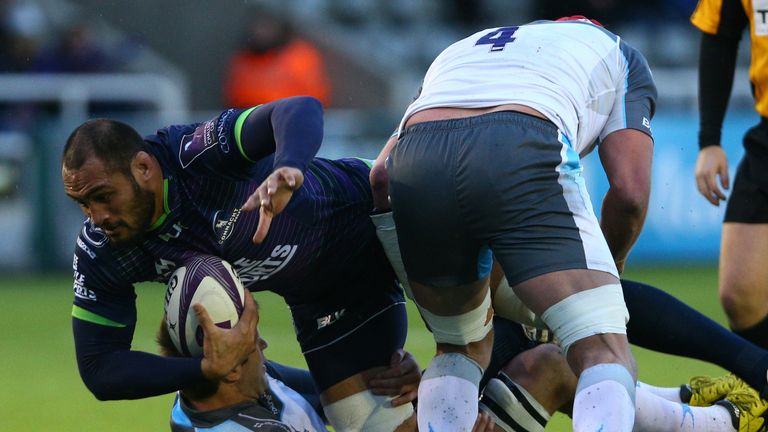 NEWCASTLE UPON TYNE, ENGLAND - DECEMBER 20 : George Naoupu of Connacht Rugby is tackled  Jon Welsh of Newcastle Falcons in the first half during the Europe