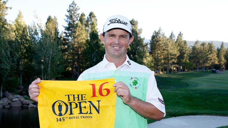 RENO, NV - JULY 03:  Greg Chalmers of Australia holds up the flag signifying he is the last player to qualify  for The Open Championship during the final r