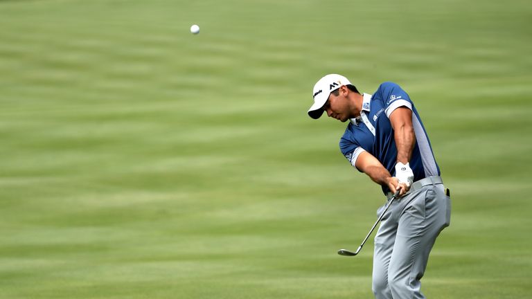 Jason Day of Australia plays a shot on the fourth hole during the second round of the World Golf Championships - Bridgestone Invitational