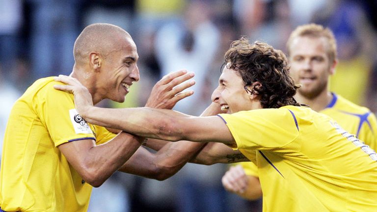 Henrik Larsson and Zlatan Ibrahimovic (R) celebrate a Sweden goal
