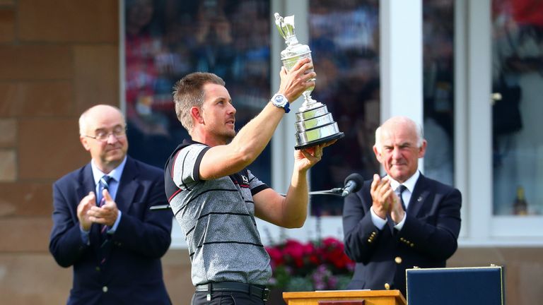 TROON, SCOTLAND - JULY 17:  Henrik Stenson of Sweden celebrates victory with the Claret Jug in front of the presentation party on the the 18th green after 