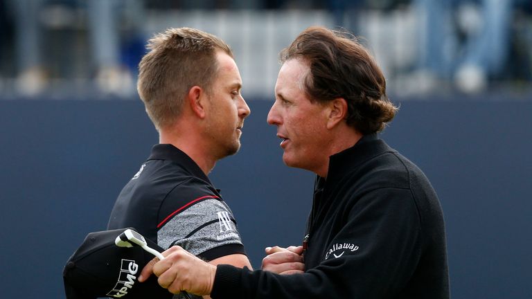 Sweden's Henrik Stenson (left) hugs USA's Phil Mickelson as he celebrates winning the Open Championship during day four of The Open Championship 2016 at Ro