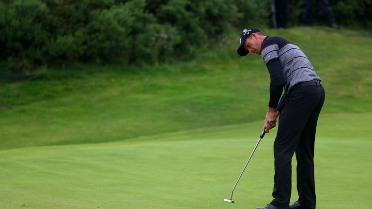 Henrik Stenson of Sweden putts on the 9th green during the final round on day four of the 145th Open