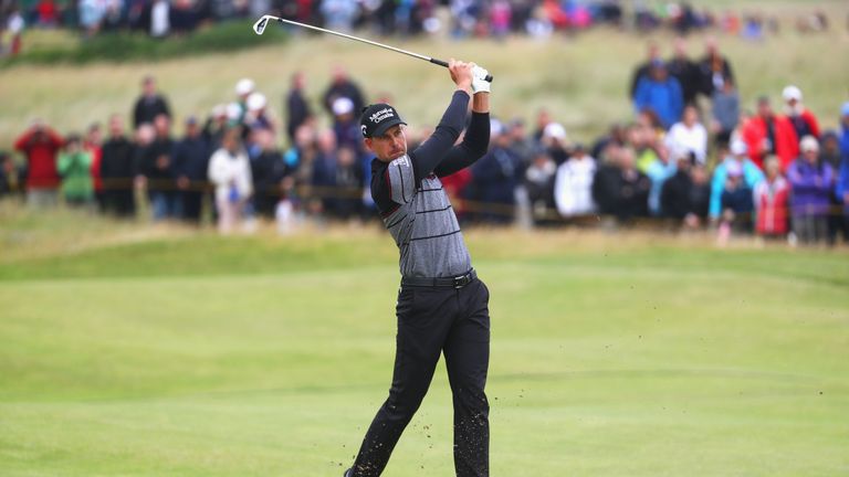 Henrik Stenson of Sweden hits his second shot on the 6th during the final round on day four of the 145th Open