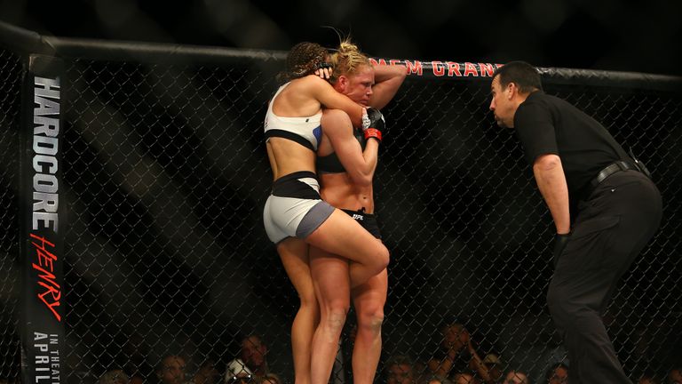 LAS VEGAS, NV - MARCH 5:  Miesha Tate attempts to submit UFC bantamweight champion Holly Holm during UFC 196 at the MGM Grand Garden Arena on March 5, 2016