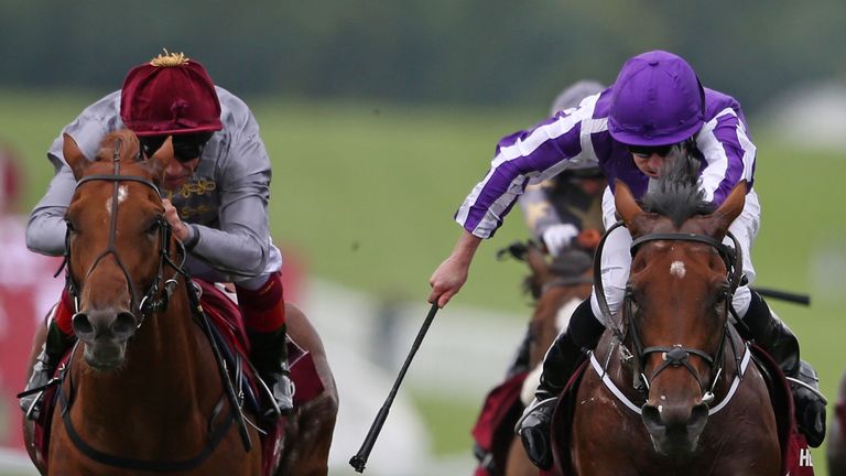 CHICHESTER, ENGLAND - JULY 27:  Ryan Moore riding The Gurkha (R) win The Qatar Sussex Stakes from Galileo Gold and Frankie Dettori (L) at Goodwood on July 