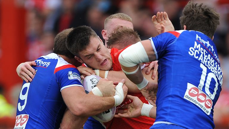 Hull KR's James Green is tackled