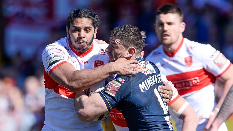 KC Lightstream Stadium, Hull, England.- Hull KR's Albert Kelly tackles Hull FC's Mark Minichiello.