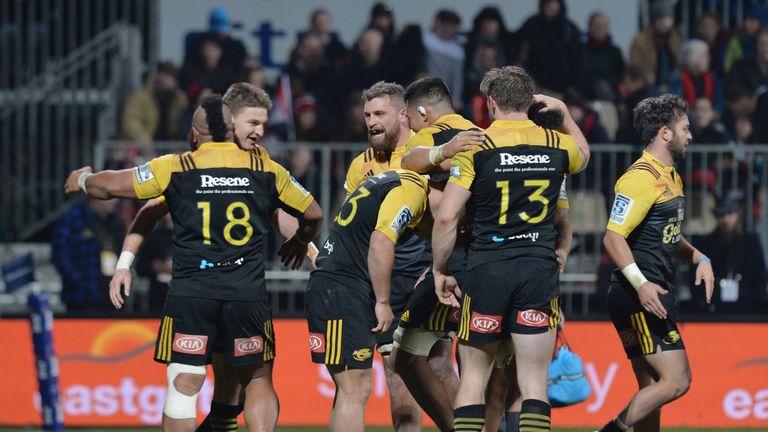 The Hurricanes celebrate after their win over the Crusaders in the round 17 Super Rugby match in Christchurch
