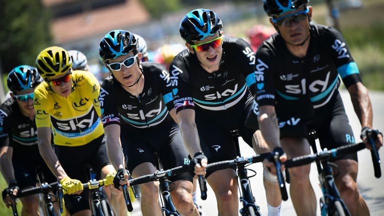 (From R) Belarus' Vasil Kiryienka, Great Britain's Ian Stannard, Great Britain's Geraint Thomas, Great Britain's Christopher Froome, wearing the overall le