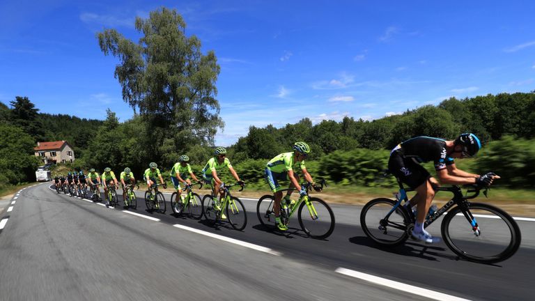 Great Britain's Ian Stannard (R) rides in the pack ahead of cyclists of the Russia's Tinkoff cycling team during the 216 km fifth stage of the 103rd editio