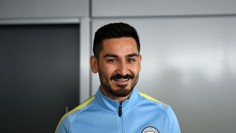 Manchester City's German midfielder Ilkay Gundogan arrives to meet members of the media at the City Football Academy in Manchester, north west England on J