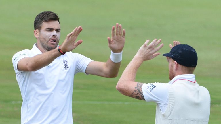 James Anderson of England celebrates the wicket of Stephen Cook of South Africa with Ben Stokes during day 4 of the 4th Test, 25 January 2016