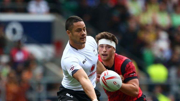 LONDON, ENGLAND - MAY 21: Jarryd Hayne of Fiji off loads the ball in the tackle during the pool round match between Fiji and Wales during the HSBC London S