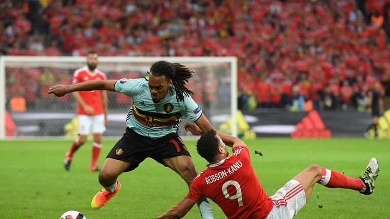 LILLE, FRANCE - JULY 01: Jason Denayer of Belgium and Hal Robson-Kanu of Wales compete for the ball during the UEFA EURO 2016 quarter final match between W