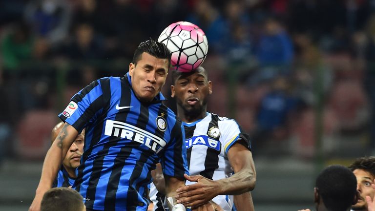Udinese's defender from Mali Molla Wague (R)  fights for the ball with Inter Milan's defender from Colombia Jeison Murillo during the Italian Serie A footb