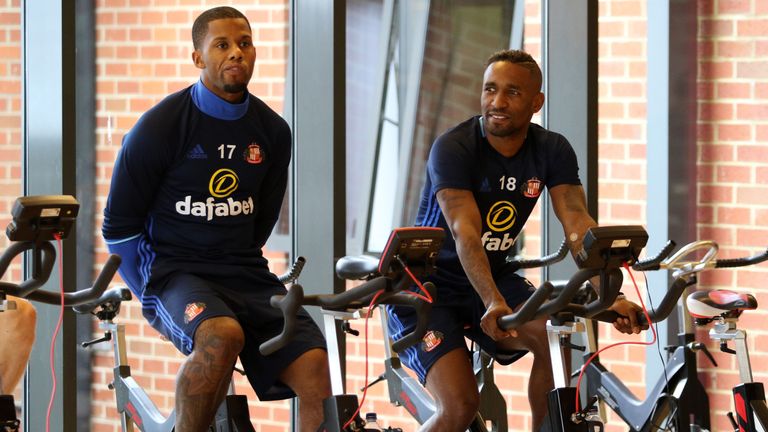 Jermain Defoe and Jermain Lens (L) take to the exercise bikes on the first day of Sunderland training at The Academy of Light