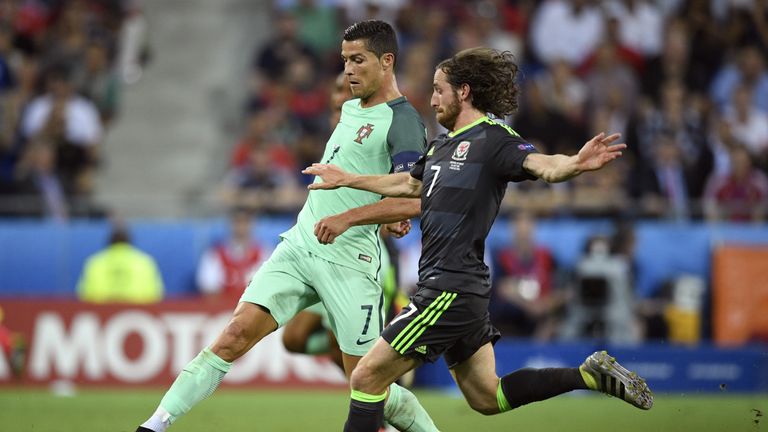 Portugal's forward Cristiano Ronaldo (L) vies for the ball against Wales' midfielder Joe Allen during the Euro 2016 semi-final football match between Portu