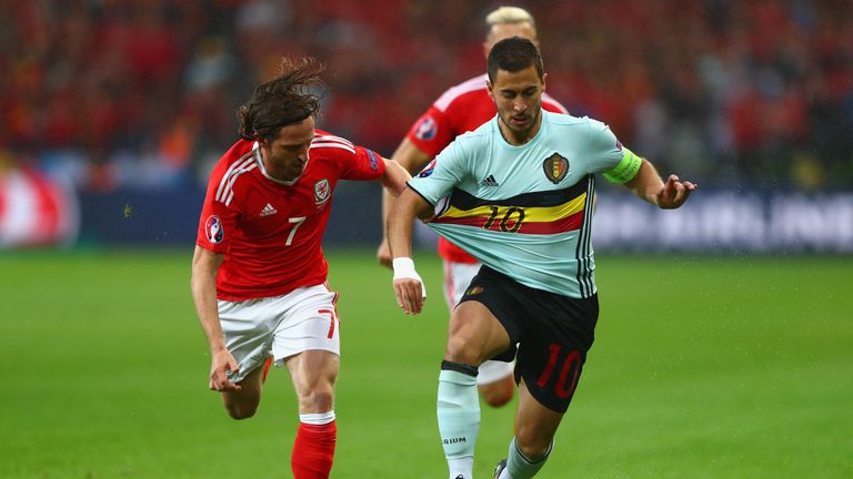 LILLE, FRANCE - JULY 01:  Eden Hazard of Belgium and Joe Allen of Wales compete for the ball  during the UEFA EURO 2016 quarter final match between Wales a