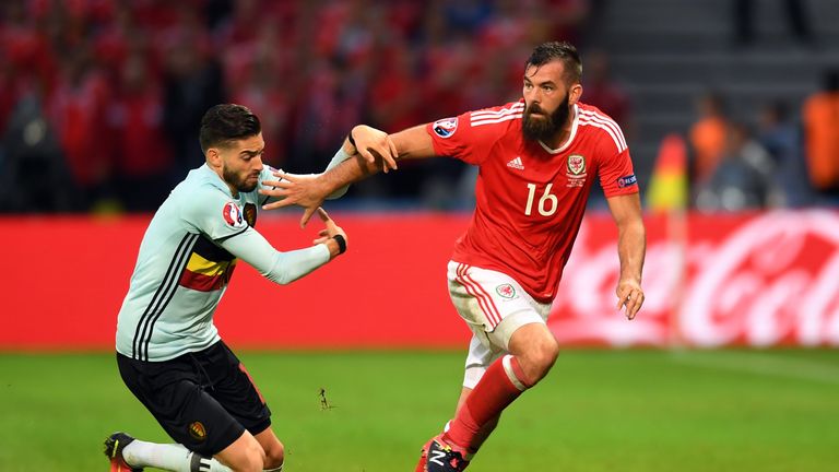 LILLE, FRANCE - JULY 01: Joe Ledley of Wales and Yannick Carrasco of Belgium compete for the ball during the UEFA EURO 2016 quarter final match between Wal