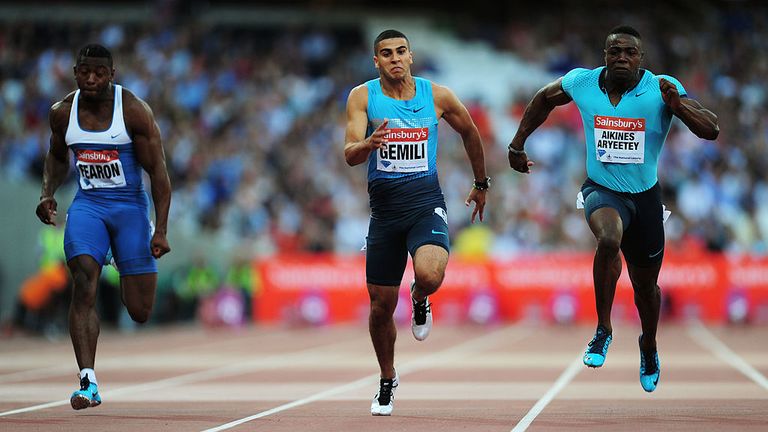 LONDON, ENGLAND - JULY 26:  Joel Fearon of Great Britain, Adam Gemili of Great Britain and Harry Aikines-Aryeetey of Great Britain compete in the Men's 100