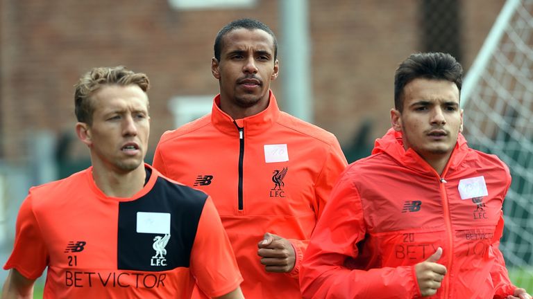 New signing Joel Matip (centre) trains at Melwood for the first time