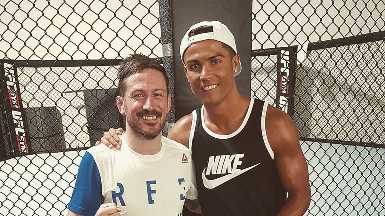 Cristiano Ronaldo poses with John Kavanagh, Conor McGregor's head coach