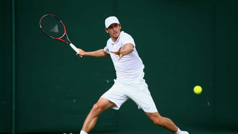 LONDON, ENGLAND - JUNE 30:  John Millman of Australia plays a forehand during the Men's Singles second round match against Benoit Pare of France on day fou