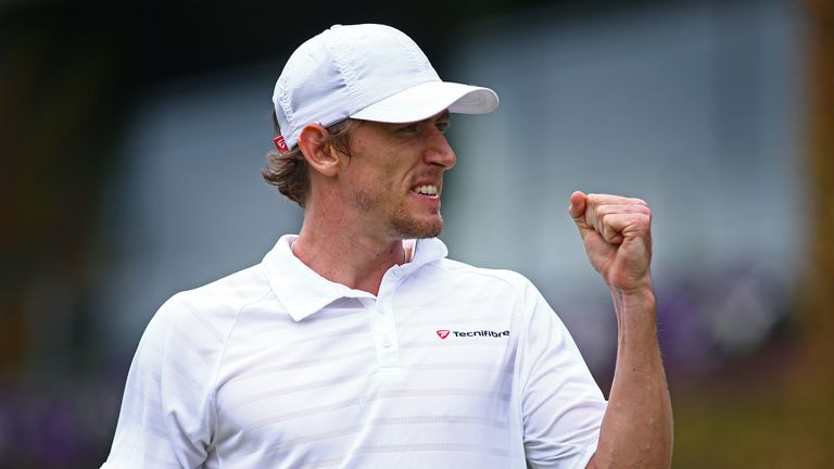 John Millman of Australia celebrates during the Men's Singles second round match against Benoit Pare of France on day four of t
