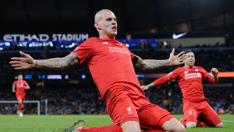Liverpool's Slovakian defender Martin Skrtel (C) celebrates with teammates after scoring their fourth goal of the English Premier League football match bet