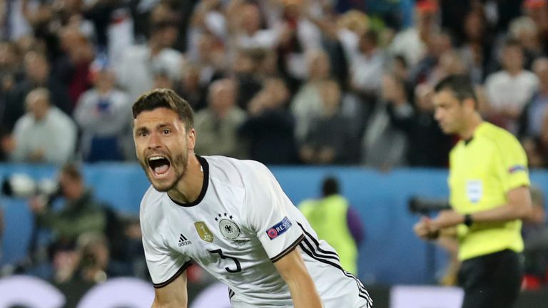 Germany's Jonas Hector celebrates after scoring the winning penalty