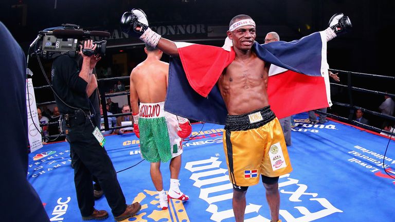 Jonathan Guzman celebrates after defeating Danny Aquino during their Super Bantamweight bout on October 10, 2015.