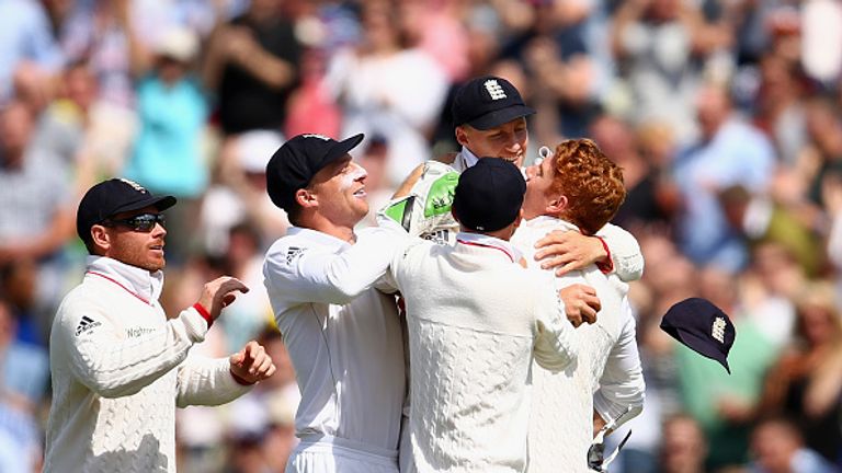 BIRMINGHAM, ENGLAND - JULY 31:  Joe Root of England celebrates with Jos Buttler and Jonny Bairstow of England after taking a catch to dismiss Josh Hazlewoo