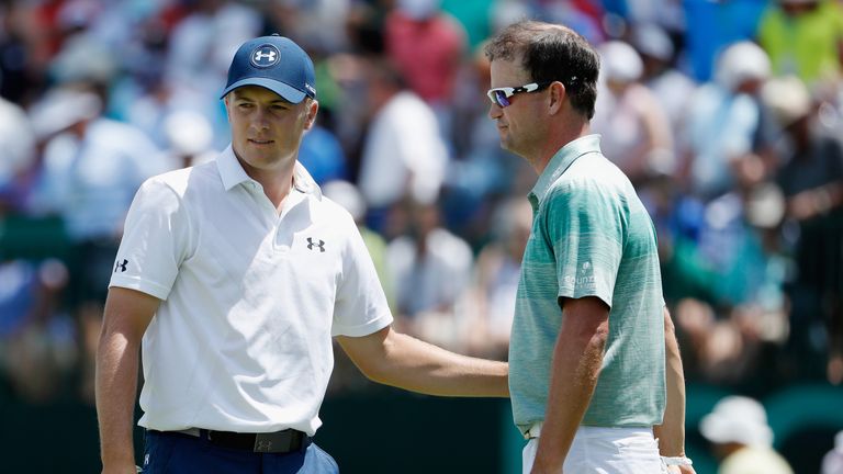 OAKMONT, PA - JUNE 18:  Jordan Spieth and Zach Johnson of the United States shake hands following the completion of the continuation second round of the U.