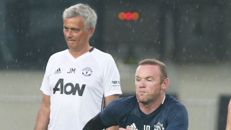 Manchester United skipper Wayne Rooney training in front of Jose Mourinho