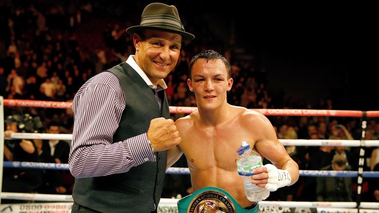 LEEDS, ENGLAND - APRIL 11: Actor Vinnie Jones (L) celebrates with Josh Warrington of Leeds after he defeated Dennis Tubieron of the Philippines during the 