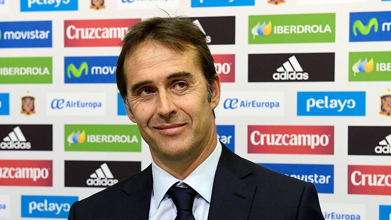 Spanish coach Julen Lopetegui smiles during a press conference following his appointment as new manager of the Spanish national football team