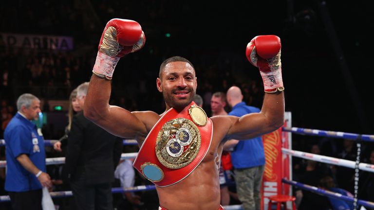 SHEFFIELD, ENGLAND - MARCH 26:  Kell Brook celebrates victory over Kevin Bizier in the second round of the IBF World Welterweight Championship fight betwee