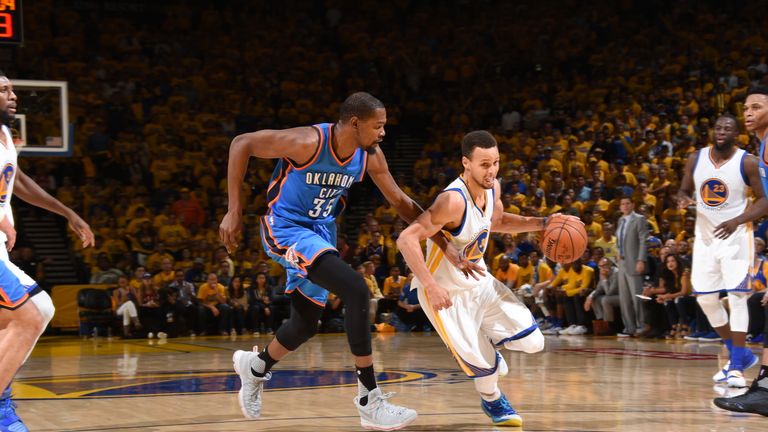 OAKLAND, CA - MAY 30: Stephen Curry #30 of the Golden State Warriors drives to the basket against Kevin Durant #35 of the Oklahoma City Thunder during Game