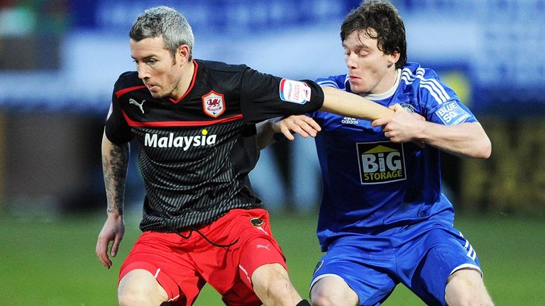 Kevin McNaughton (L) in action for Cardiff