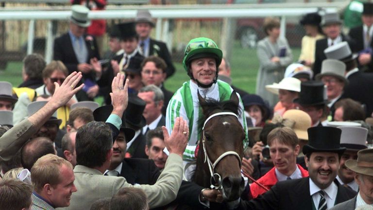 Kieren Fallon on Oath, heads for the winning enclosure after winning the Vodafone Derby at Epsom.