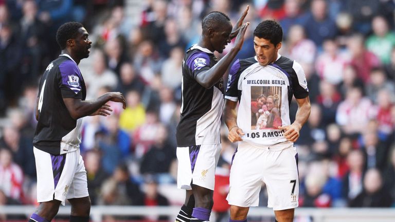 Kolo Toure, Mamadou Sakho (C) celebrate a Luis Suarez goal for Liverpool