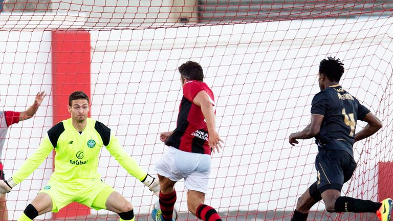 Lee Casciaro scores the Lincoln Red Imps goal against Celtic