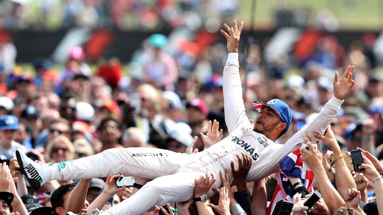 Lewis Hamilton celebrates his victory in the 2016 British Grand Prix