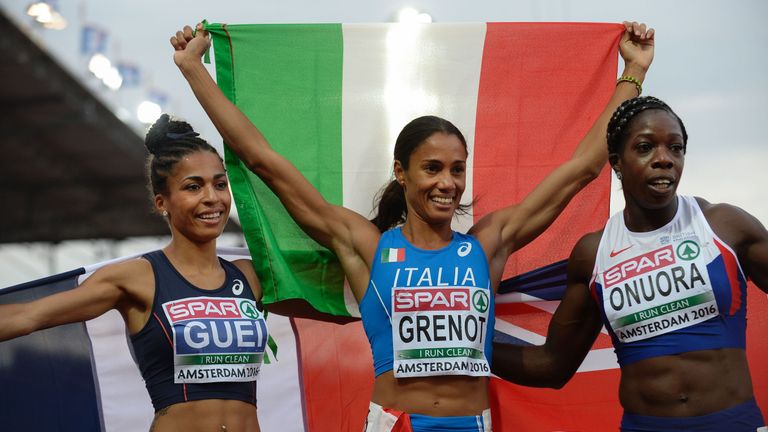 (From L) France's Floria Guei, Italy's Libania Grenot and Great Britain's Anyika Onuora react after the women's 400 final race 