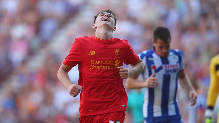 WIGAN, ENGLAND - JULY 17:  Ben Woodburn of Liverpool celebrates after scoring the second goal during a pre-season friendly between Wigan Athletic and Liver