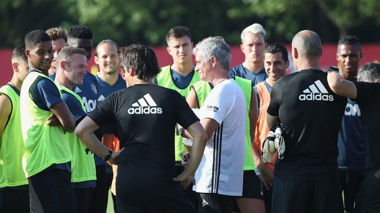 Mourinho addresses his squad during training in Shanghai
